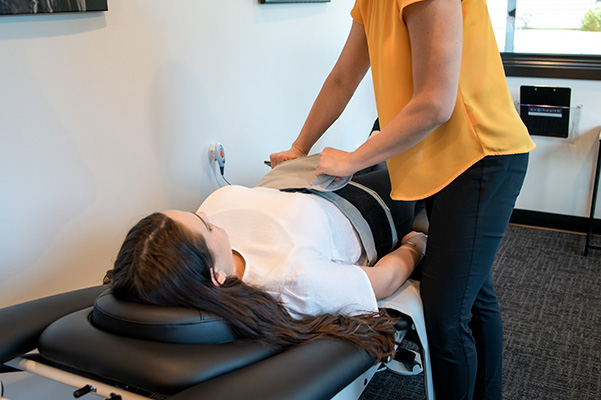 Chiropractor in Chanhassen Bethany Curnow Adjusting Patient